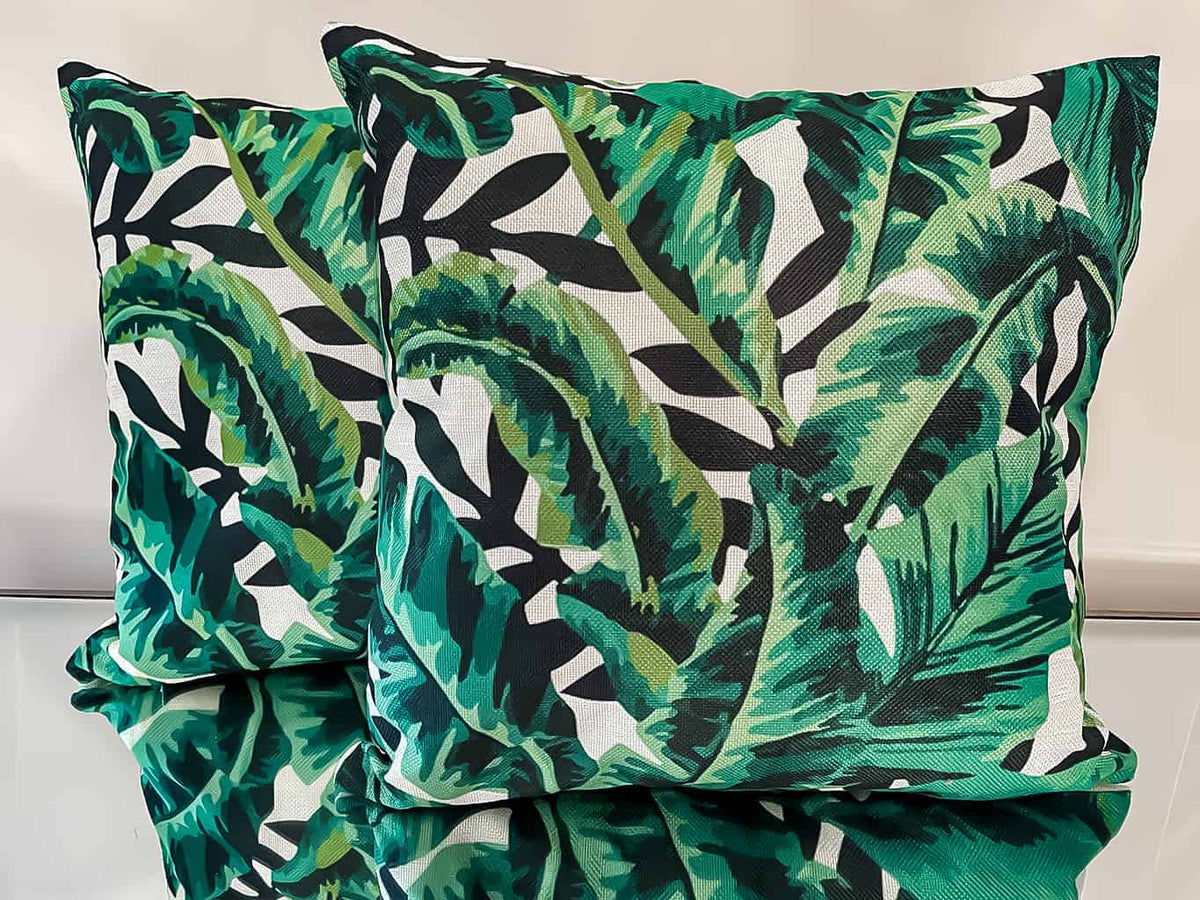 Pair of printed green leaf cotton cushions
