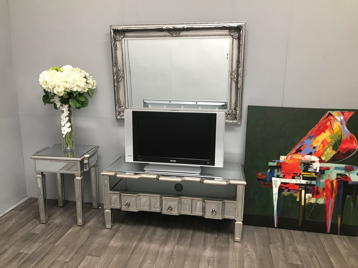 Mirrored TV units with three drawers and a shelf