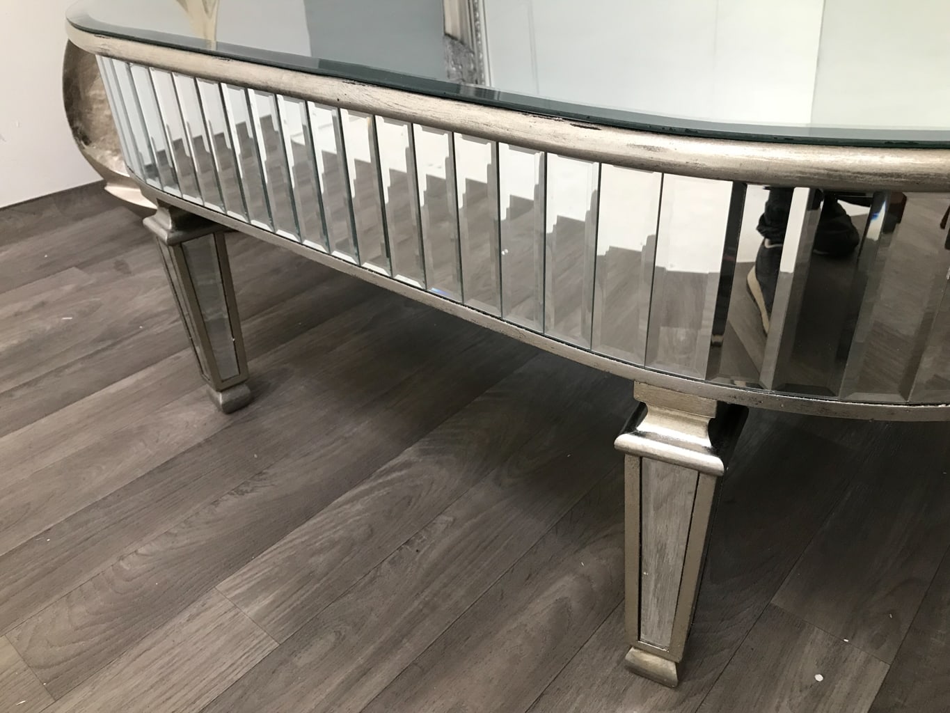 Mirrored Coffee Table with glass Panels an Oval  shape